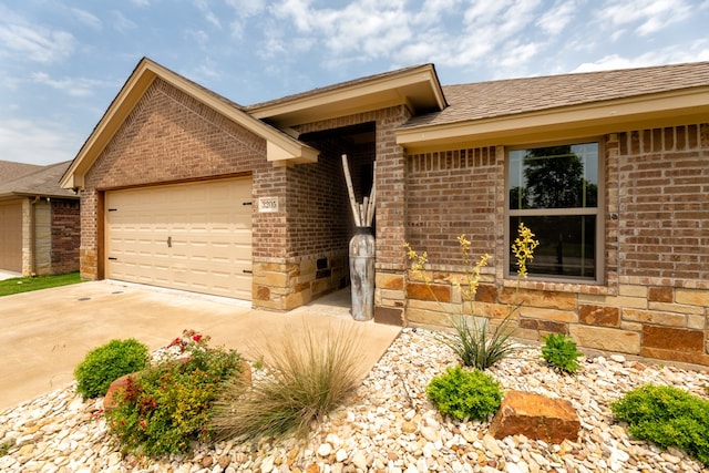 ranch-style house featuring a garage