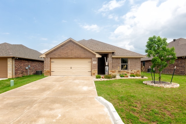 view of front facade featuring a garage and a front lawn