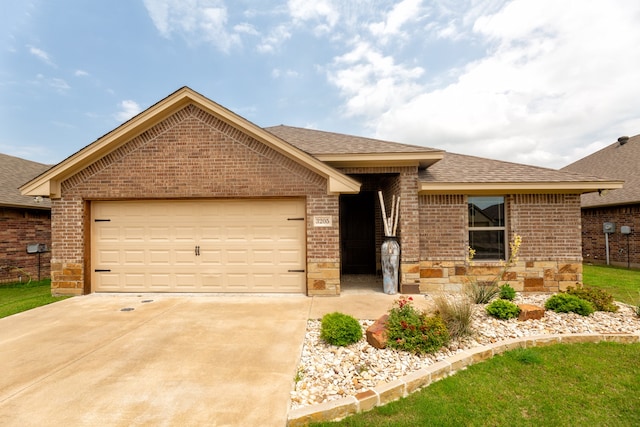 ranch-style home featuring a garage