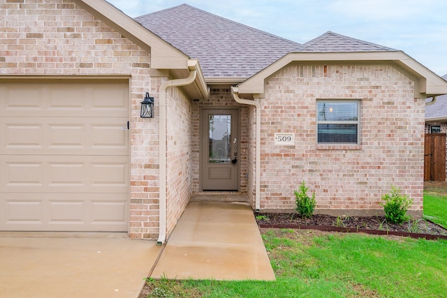 property entrance featuring a garage