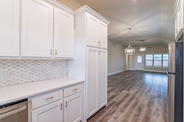 kitchen with white cabinetry, appliances with stainless steel finishes, tasteful backsplash, ceiling fan, and dark hardwood / wood-style flooring