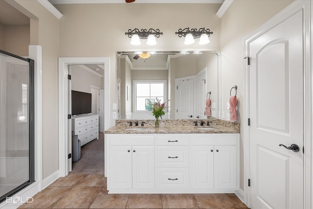 bathroom featuring walk in shower, vanity, and ornamental molding