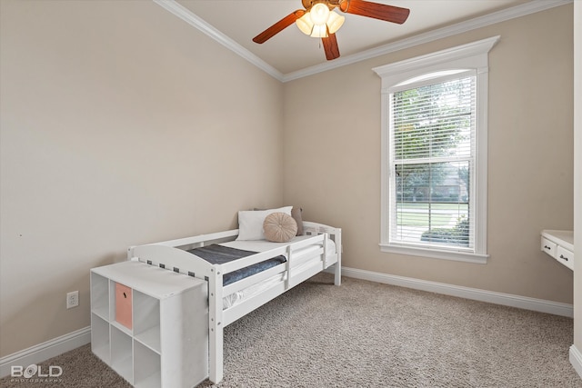 carpeted bedroom featuring ornamental molding, multiple windows, and ceiling fan