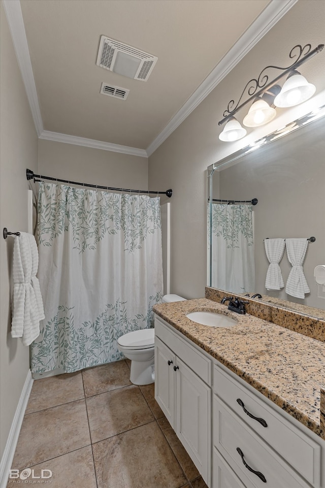 bathroom with toilet, vanity, tile patterned floors, and ornamental molding