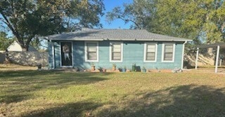 view of front facade with a front lawn