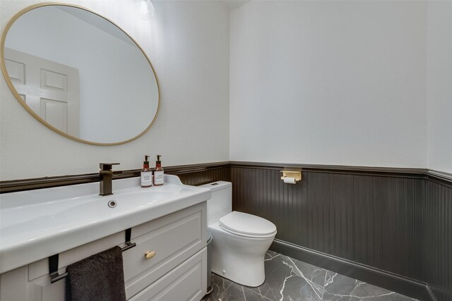 bathroom with toilet and sink