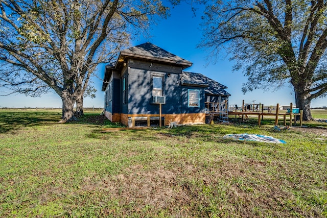 view of yard with a wooden deck