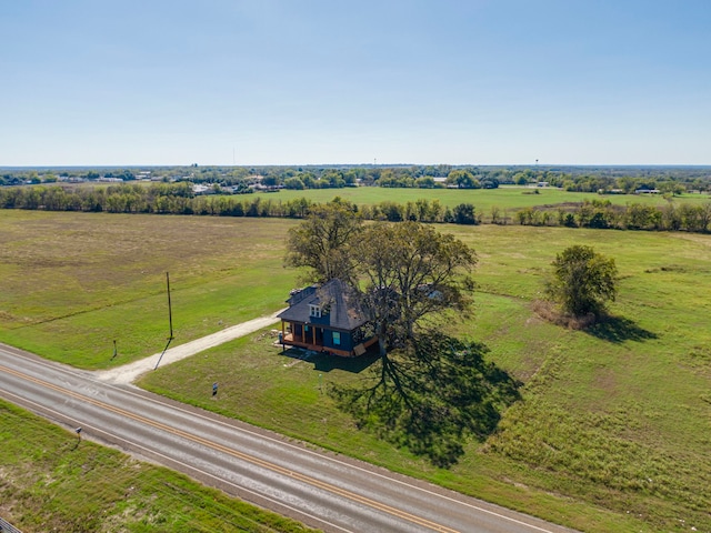 birds eye view of property featuring a rural view