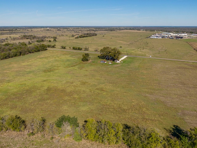 birds eye view of property featuring a rural view