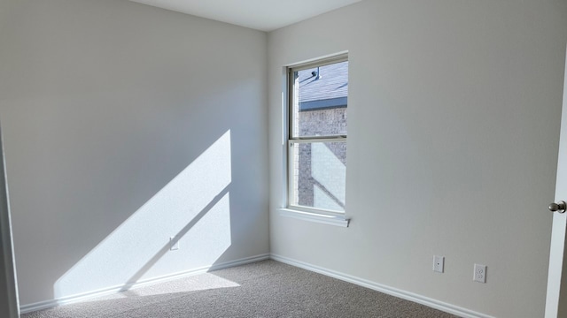 view of carpeted spare room