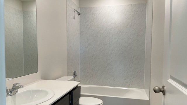 full bathroom featuring vanity, toilet, and tiled shower / bath combo