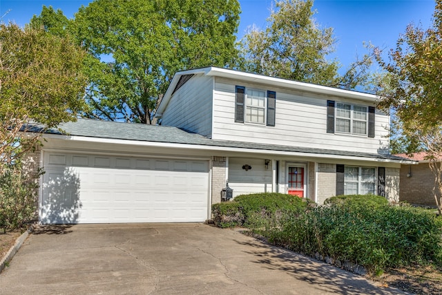 front of property featuring a garage