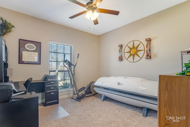 carpeted bedroom with ceiling fan