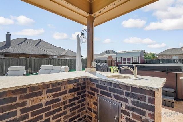 view of patio featuring a wet bar