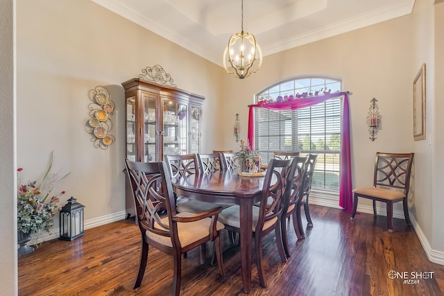 dining space with ornamental molding, dark hardwood / wood-style floors, and a notable chandelier