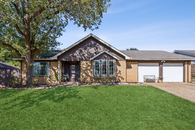 single story home with a garage and a front lawn