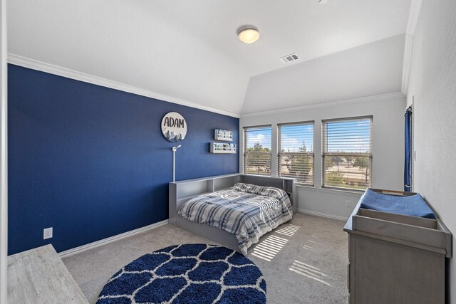 carpeted bedroom featuring vaulted ceiling and crown molding