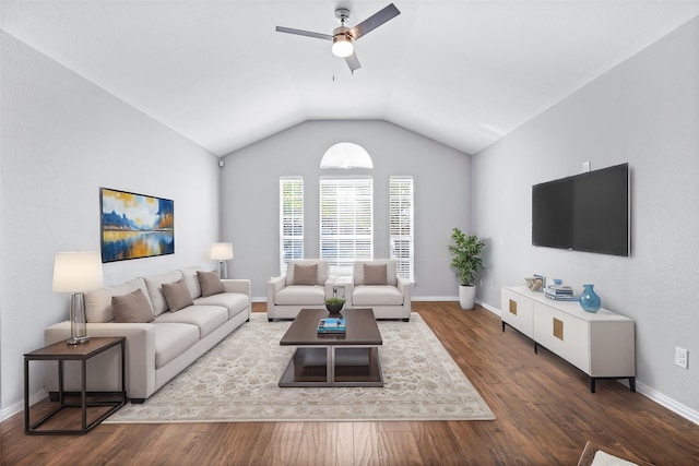 living room featuring lofted ceiling, hardwood / wood-style floors, and ceiling fan