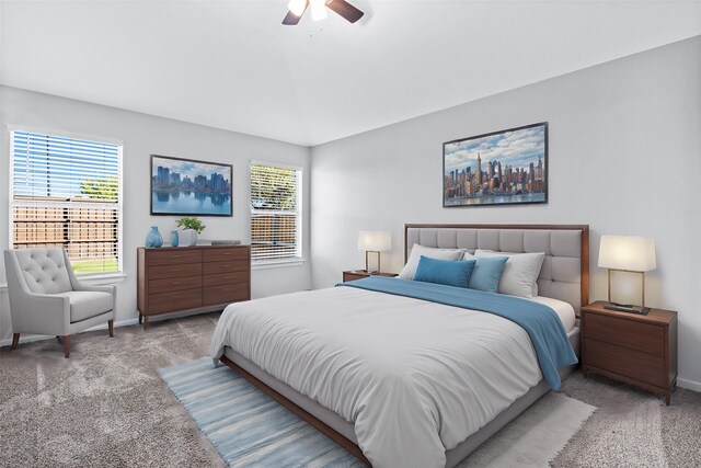 spare room with ceiling fan, hardwood / wood-style floors, and vaulted ceiling