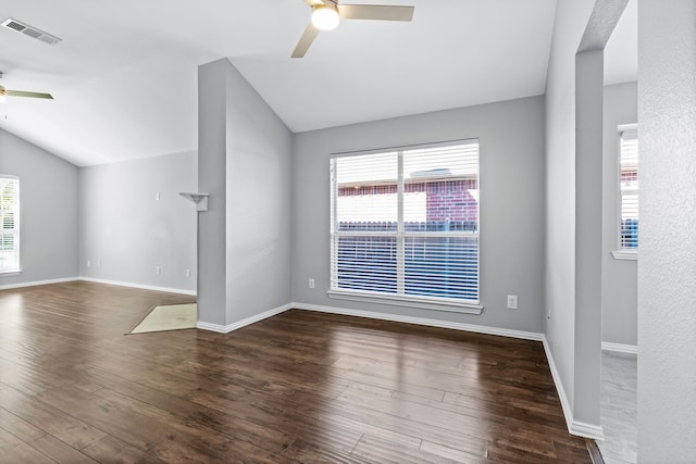 unfurnished living room with ceiling fan, dark hardwood / wood-style flooring, and lofted ceiling