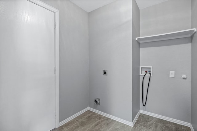 clothes washing area featuring hookup for a washing machine and hookup for an electric dryer