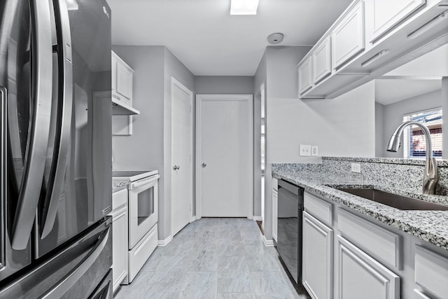 kitchen featuring dishwasher, white range with electric cooktop, white cabinets, refrigerator, and sink