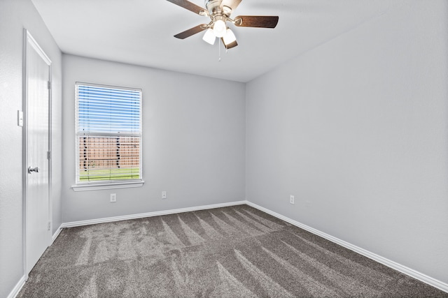 carpeted empty room with ceiling fan