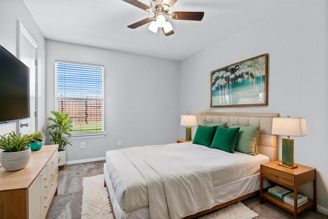 unfurnished living room featuring a tile fireplace, dark hardwood / wood-style flooring, ceiling fan, and lofted ceiling