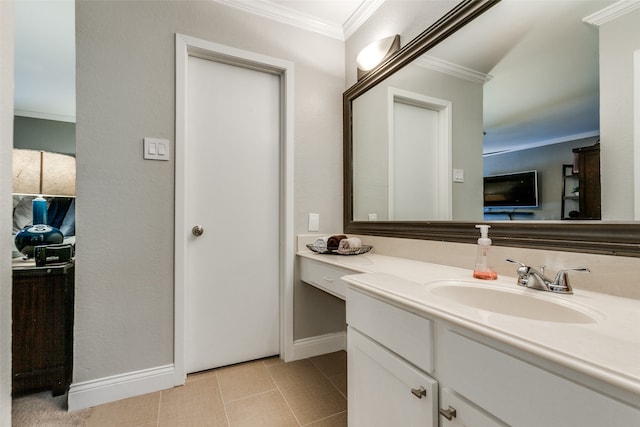 bathroom with tile patterned flooring, vanity, and ornamental molding