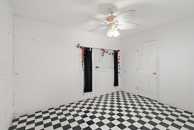 spare room with ceiling fan