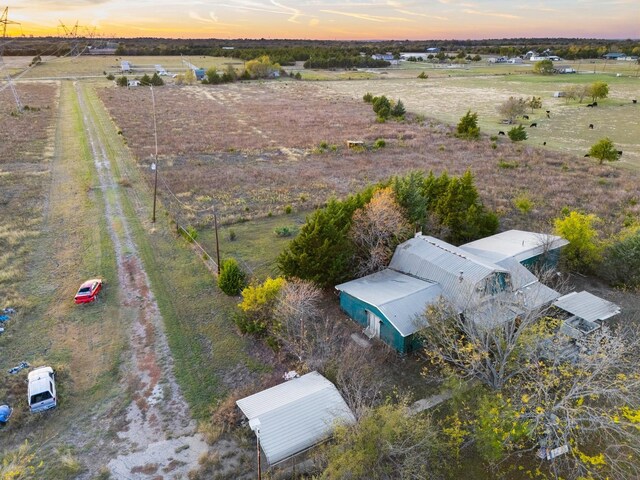 aerial view at dusk with a rural view