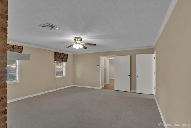 unfurnished room with crown molding, ceiling fan, and light carpet