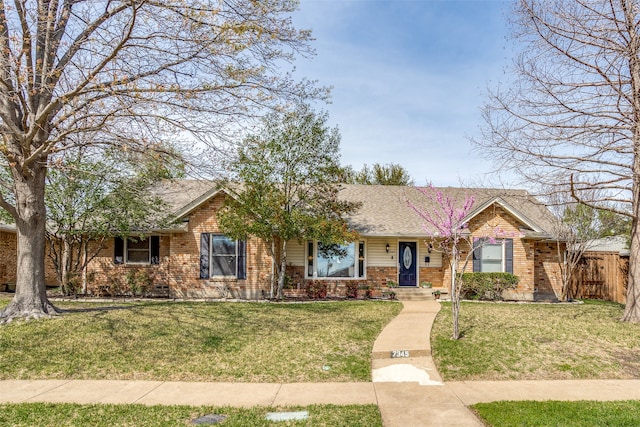 ranch-style house with a front yard