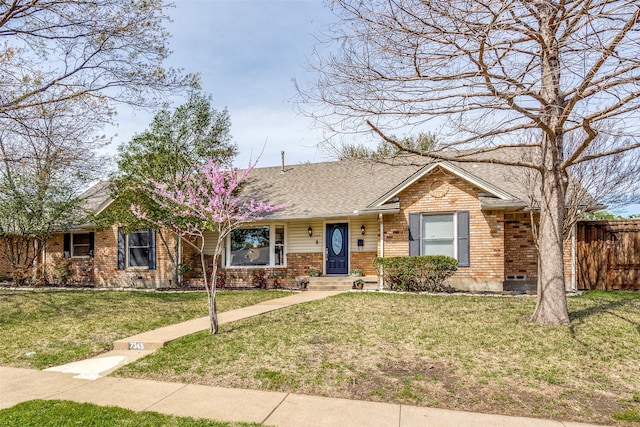 ranch-style home with a front yard