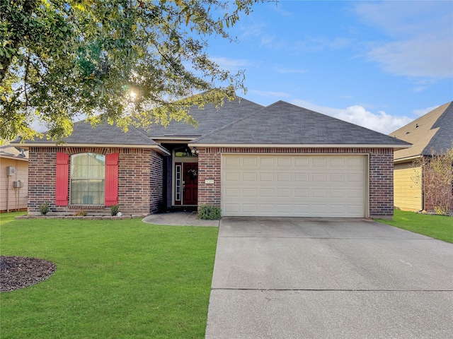 ranch-style home featuring a front lawn and a garage