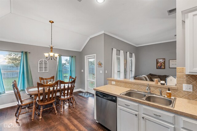 kitchen with white cabinetry, sink, hanging light fixtures, stainless steel dishwasher, and dark hardwood / wood-style floors