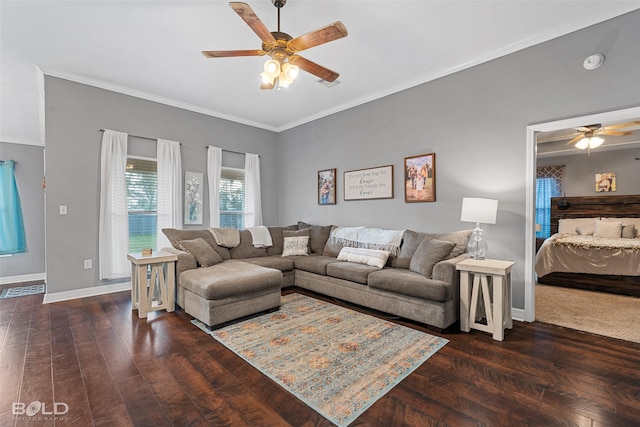 living room with ornamental molding, ceiling fan, and dark wood-type flooring