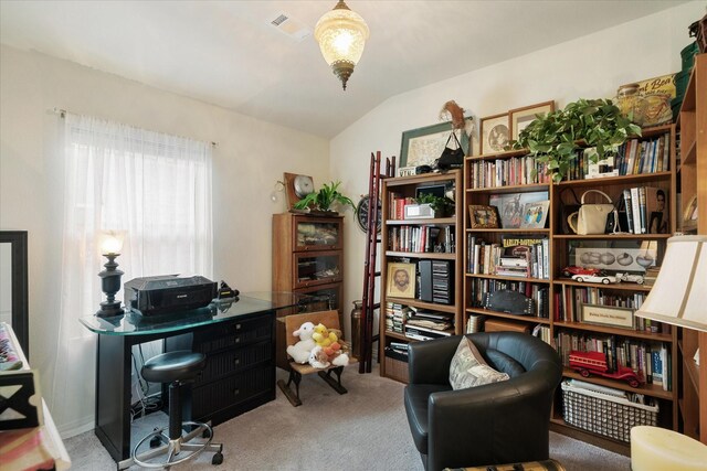 living area with lofted ceiling and carpet floors