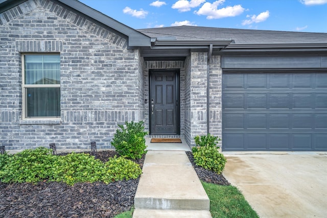 entrance to property with a garage