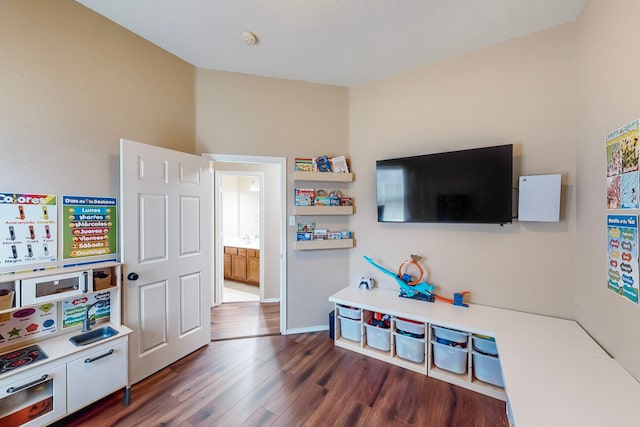 game room featuring dark hardwood / wood-style flooring