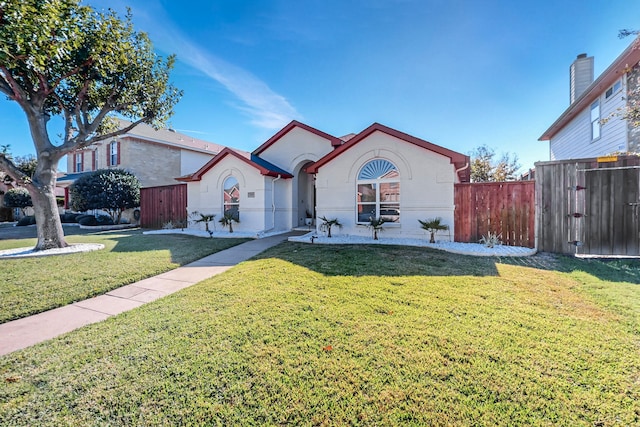 view of front of home with a front yard