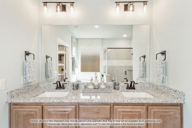 bathroom featuring vanity and walk in shower