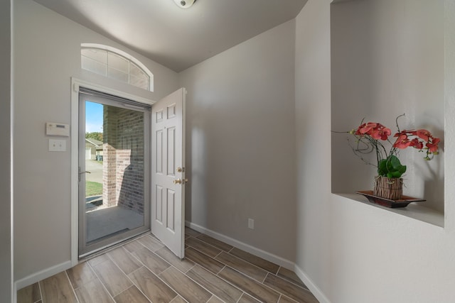 foyer entrance with light hardwood / wood-style flooring