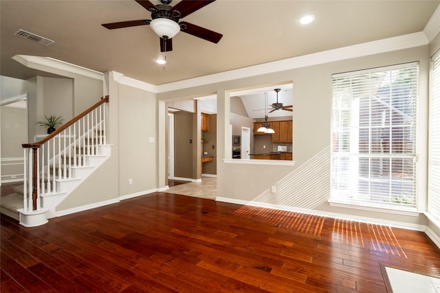 interior space with hardwood / wood-style floors and crown molding