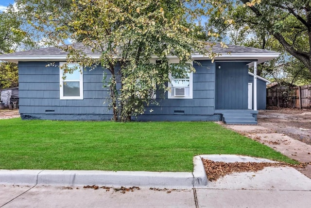 view of front facade with a front yard