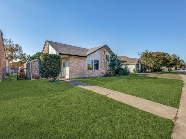 view of front of property with a front lawn