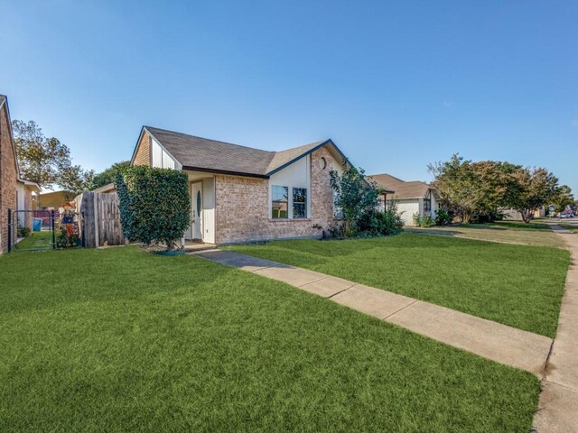 view of front of property with a front lawn