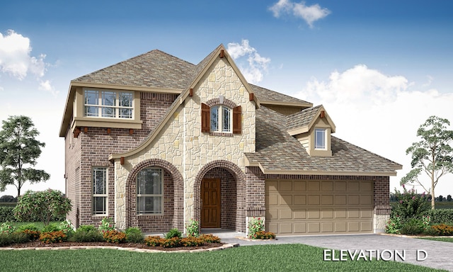 view of front facade featuring a front yard and a garage