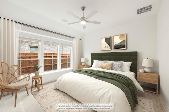 bedroom with light carpet and ceiling fan