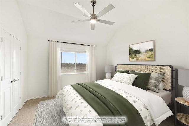 bedroom with ceiling fan, light carpet, and lofted ceiling